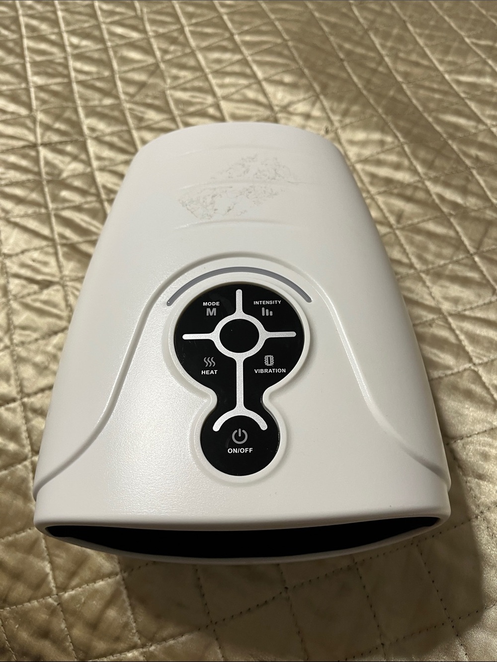 White Handheld Electronic Massager with Black Control Panel